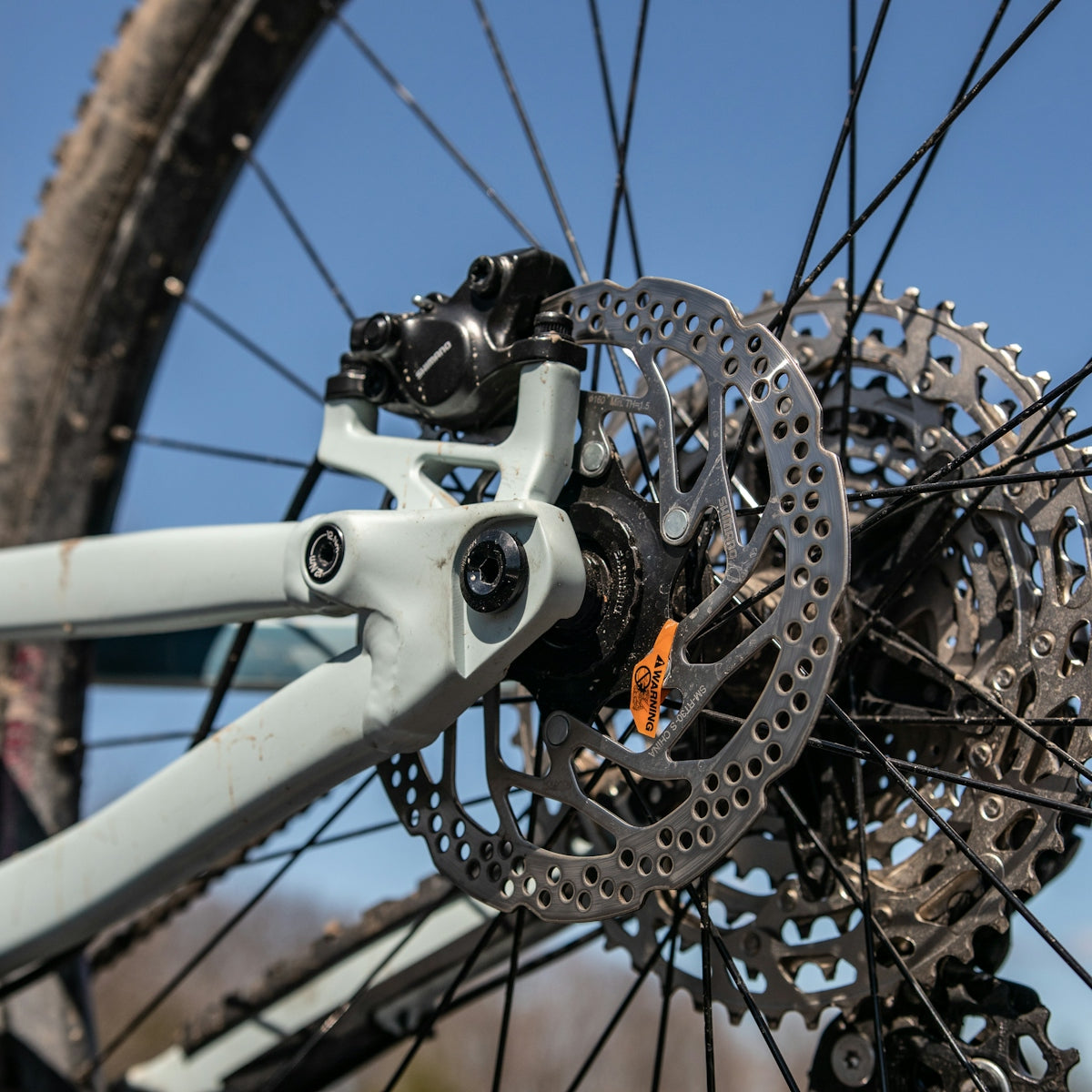 a close up of a bicycle's front wheel