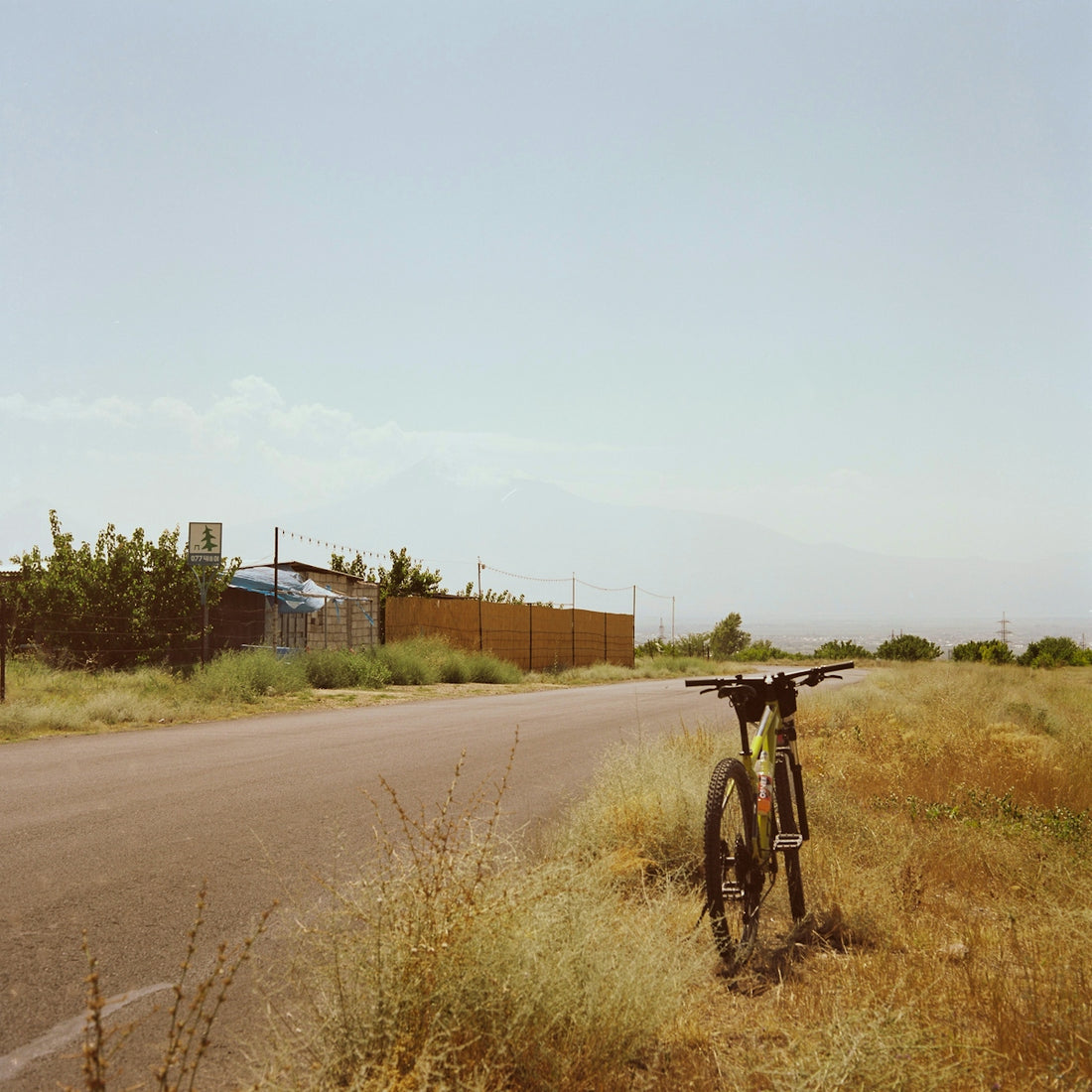 a bike parked on the side of the road