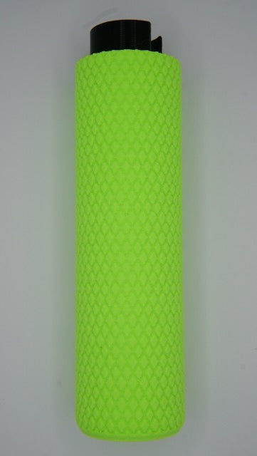 The MTB Air Grips - Green Monstah! features a bright neon green grip with a knurled, diamond pattern like mountain bike grips and a black top, displayed against a plain light background.